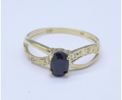 A 9ct gold, sapphire and small diamond ring, 0.9g, O