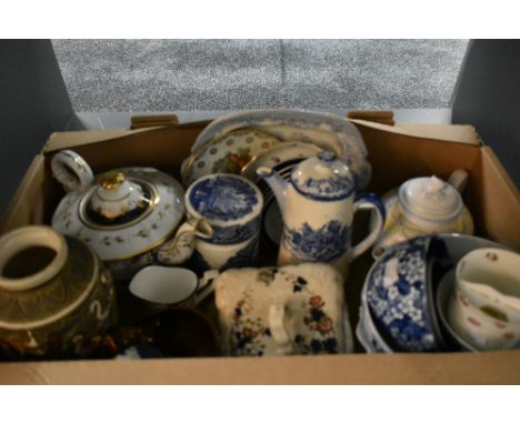 A small selection of blue and white ware including a lidded jar and teapot, bowls and plates, a copper lustre bowl and jug, a