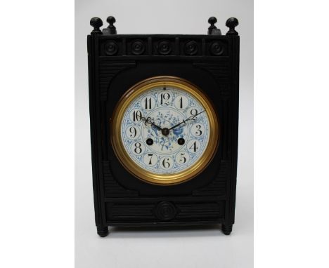 A late Victorian Aesthetic movement ebonised mantel clock, 8 day movement with T Ganter, Haverstock Hill label in door 35cm