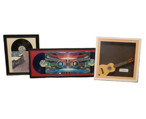 A framed Electric Light Orchestra 'Out of the Blue' LP, a framed Eagles Live album and a Joe Brown framed mandolin