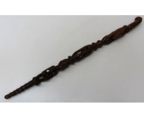 An early 20th century carved African walking stick, 89cm