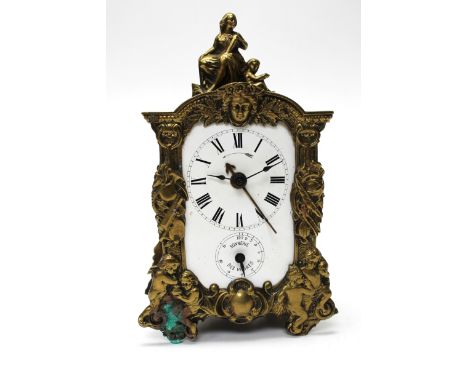 A French carriage style clock with repeat alarm marked sonnerie to the dial, 24cm