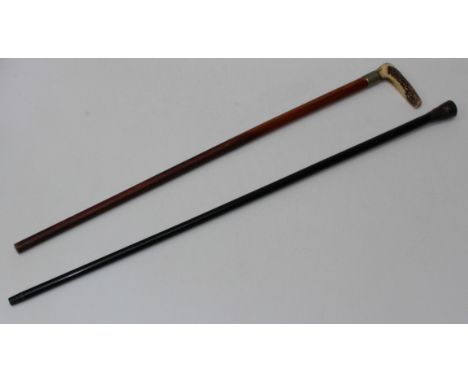 A malacca shafted walking cane, made from timber and copper from HMS Foudroyant, 92cm together with a horn handled stick (2)