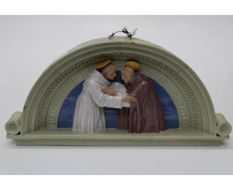 After Andrea della Robbia, a Scarce Cantagalli Firenze terracotta lunette depicting the embrace of St. Francis & St. Dominic 