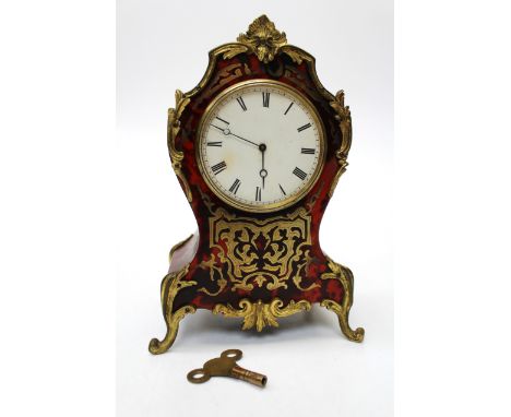 A Boulle cased mantel clock with Tic-Tac movement and white enamel dial 25cm