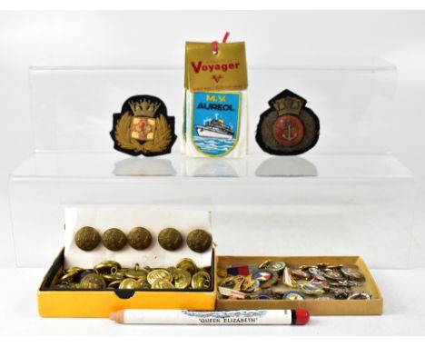 A collection of twenty-four maritime metal and enamel badges relating to various vessels to include Royal Mail's liner 'S.S. 