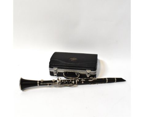 J MICHAEL; a cased clarinet.