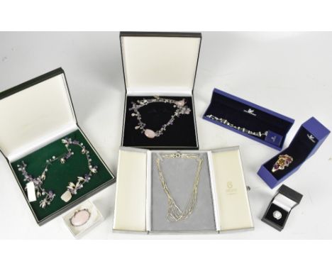 Seven cased sets of costume jewellery, to include a white metal amethyst and blue stone necklace, a white metal amethyst and 