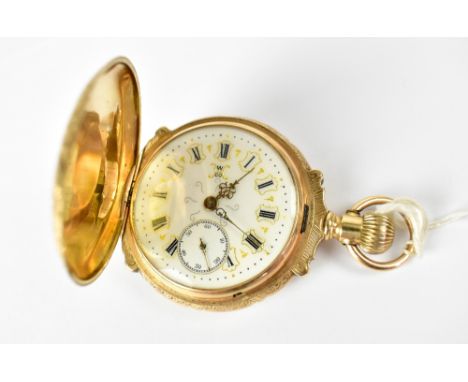 HAMPDEN WATCH CO; a vintage 14ct gold Special Railway full hunter pocket watch, the white enamelled dial set with Roman numer