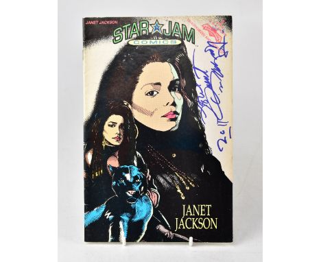 JANET JACKSON; a Star Jam comic bearing the megastar's signature and dated 2011.We have not authenticated this signature, ple