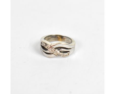 A 9ct white gold diamond crossover ring, size G, approx 5g.