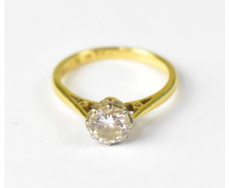 An 18ct yellow gold ring with platinum claw set diamond, approx 0.8ct, in cathedral mount, size K, approx 2.7g. CONDITION REP