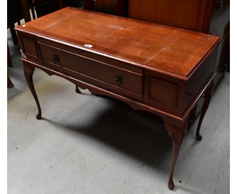 DYNATRON; a SR X 32 Series radiogram within a crossbanded mahogany table case, with slender shell carved cabriole legs to pad