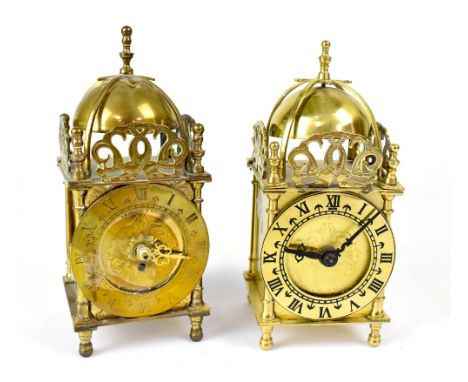 Two contemporary brass carriage clocks with domed bell tops, the brass dials set with black Roman numerals, one engraved vers