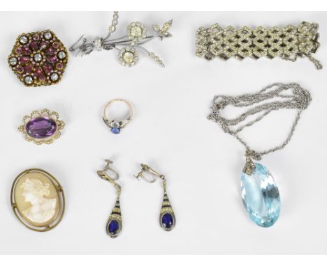 A small collection of costume jewellery to include brooches, bracelet, ring, earrings, etc.