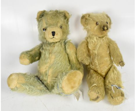 An early 20th century blond Merrythought teddy bear with Merrythought button in ear, length 34cm and an early 20th century Ge