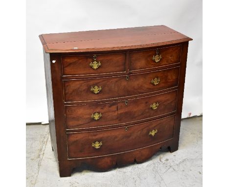 A Victorian mahogany bow front chest of two short over three long drawers, raised on bracket feet, 104 x 111 x 53cm (af). CON