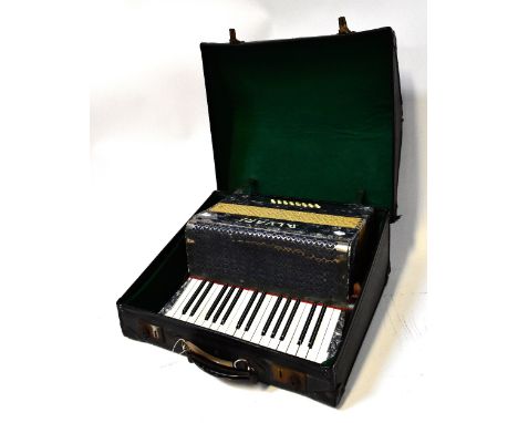ALVARI; a cased piano accordion. 