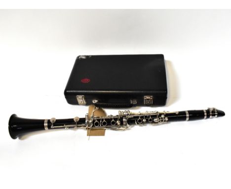 BLESSING; a cased clarinet.