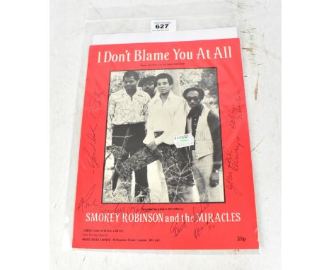 SMOKEY ROBINSON; 'I Don't Blame You at All', a music score bearing his and further signatures to the cover.We have not authen