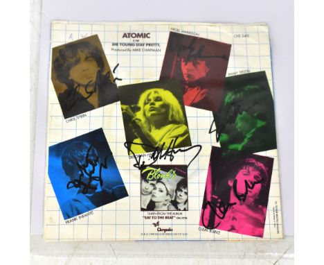 BLONDIE; 'Atomic', a 7" SINGLE BEARING the band's signatures to the rear cover.We have not authenticated these signatures, pl