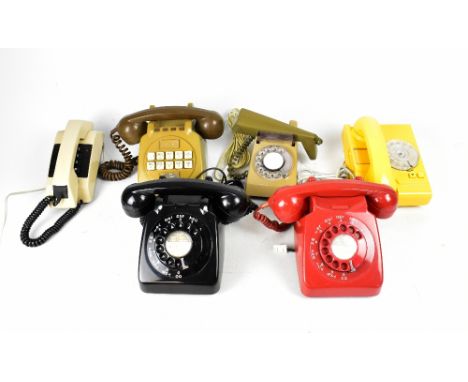 Six 20th century vintage telephones to include a bright yellow dial example no.8100RGNA81/1, a GPO example, black and red exa