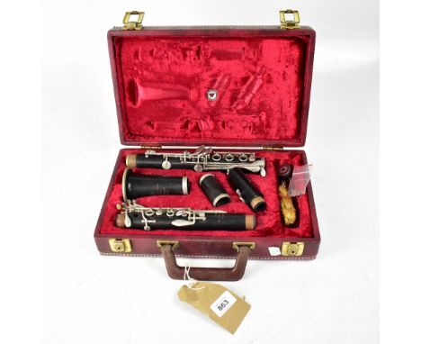 SUPER GRADUATE; a cased clarinet.