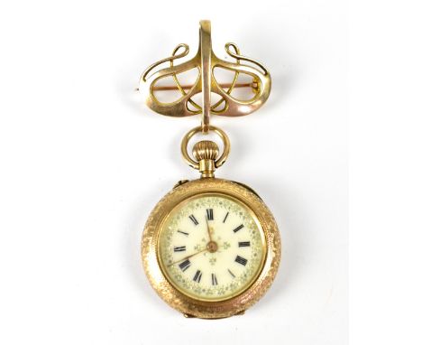 An early 20th century 9ct gold open face fob watch, the white enamelled dial set with Roman numerals and floral border, crown