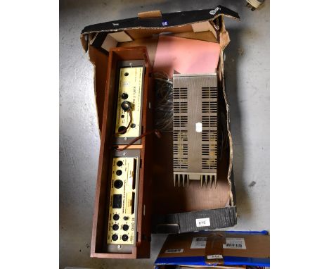 A Quad 303 power amplifier and a Quad 33076 tape adaptor, disc adaptor, and a Quad FM3 tuner, in teak case (3).