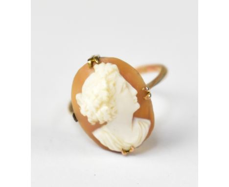A 9ct rose gold ring with claw set carved shell cameo, size L, approx 2.5g.