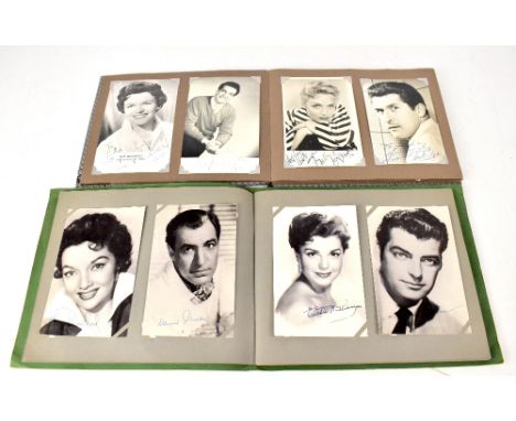 Two small albums containing lobby and fan cards, bearing autographs of Music, TV and Film stars to include Tony Curtis, Kirk 