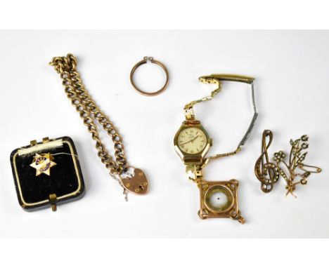 Various items of gold and yellow metal jewellery to include a ladies' vintage Record wristwatch, on a gold plated strap, an 1