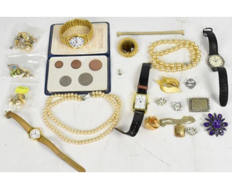 A quantity of modern, vintage and possibly antique costume jewellery to include a silver necklace bracelet and earring set, a