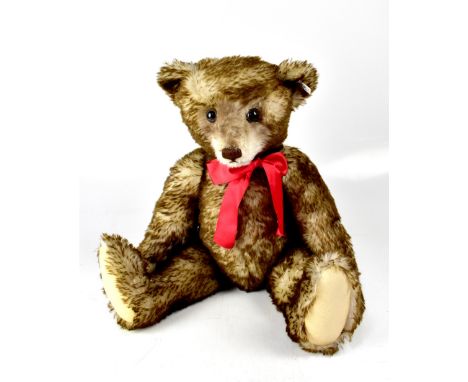 STEIFF; a replica Teddybär 1926 bear, with Steiff button and label in left ear, length 71cm.