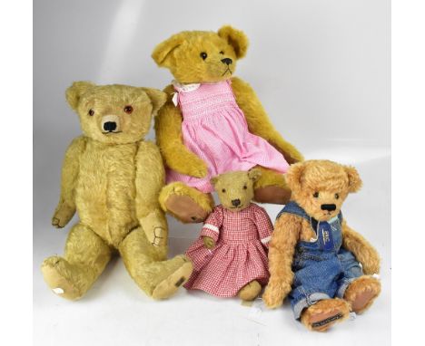 Four early/mid-20th century teddy bears comprising a Bay bear in denim dungarees, length 50cm, an early 20th century blond mo