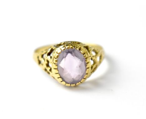 A vintage 9ct gold ring bezel set with amethyst-coloured stone, size R, approx 2.7g.