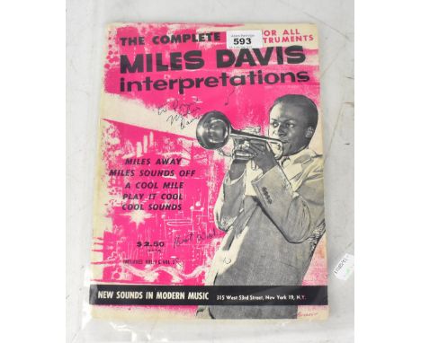 MILES DAVIS; 'The Complete Miles Davis Interpretations', music book bearing the legend's signature to the cover and also insi