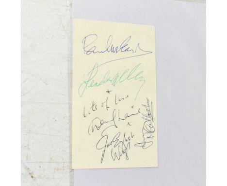 WINGS; a 1971 first day issue card bearing several signatures, including Sir Paul McCartney and other band members.We have no