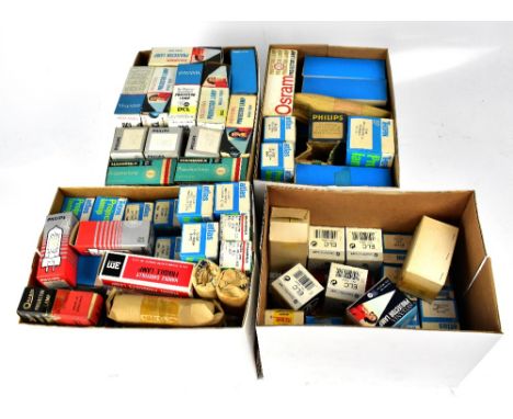 Four boxes of projector bulbs, various voltage, wattage and fittings, including some examples from Phillips, Osram, Atlas, et