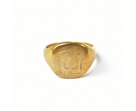 A 9ct yellow gold gentlemen's signet ring with indistinct initials, size N, approx 5.7g.