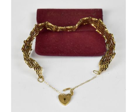 A 9ct yellow gold five bar gate bracelet, approx 6.3g.