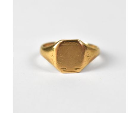 A 9ct yellow gold signet ring, size V, approx 4.8g.