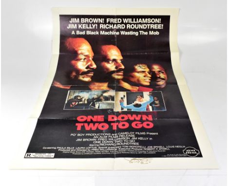 ONE DOWN, TWO TO GO; a folded poster for the film, bearing the signatures of Jim Kelly, Richard Roundtree, Jim Brown and Fred