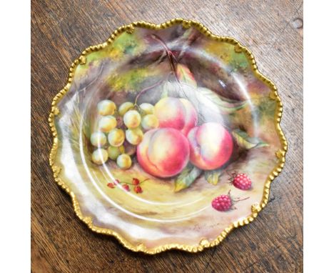 THOMAS LOCKYER FOR ROYAL WORCESTER; a hand painted cabinet plate depicting peaches, grapes and Summer fruits, with gilt-heigh