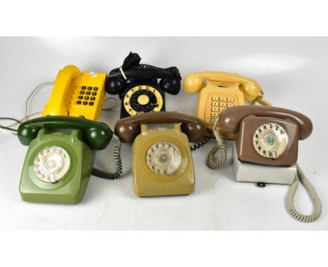 Six vintage early 20th century telephones in various colourways, some GPO examples, to include a Series 300 black phone, mush