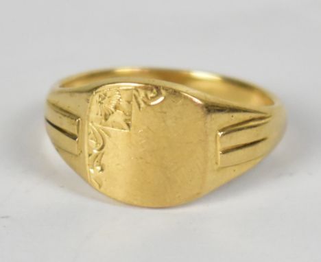 A hallmarked 9ct gold signet ring, approx 6.2g. 