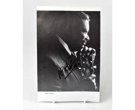 B B KING; a page torn from a magazine bearing his signature.We have not authenticated this signature, please satisfy yourself
