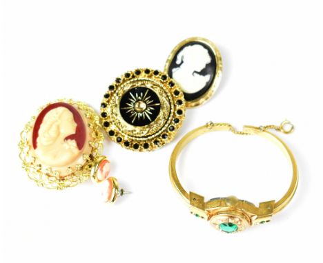 A small quantity of jewellery to include a bangle watch with concealed dial, a mourning-style brooch and cameo brooches. 