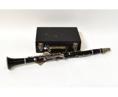 KING; a cased clarinet.