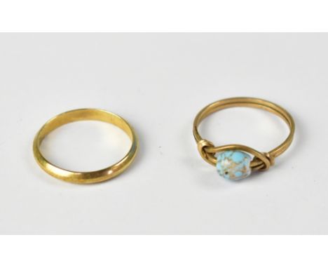 A 9ct yellow gold band ring, size P, approx 1.6g and a yellow metal double wire ring with turquoise bead to the top, size P (